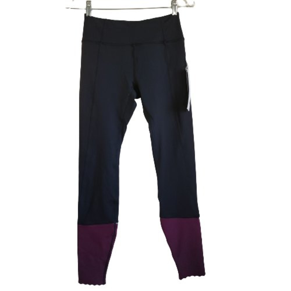 Kyodan leggings Size XS Black/Purple Reflective Strip Decorative Hem Pocket NWT